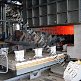 Industrial pusher-type furnaces with gas heating for heat treatment