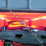 Industrial pusher-type furnaces with gas heating for heat treatment